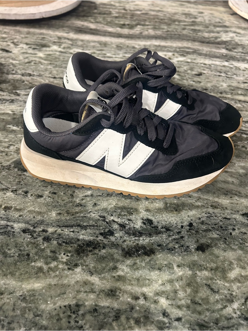 New Balance woman’s Black Gray White Retro Runner Sneakers